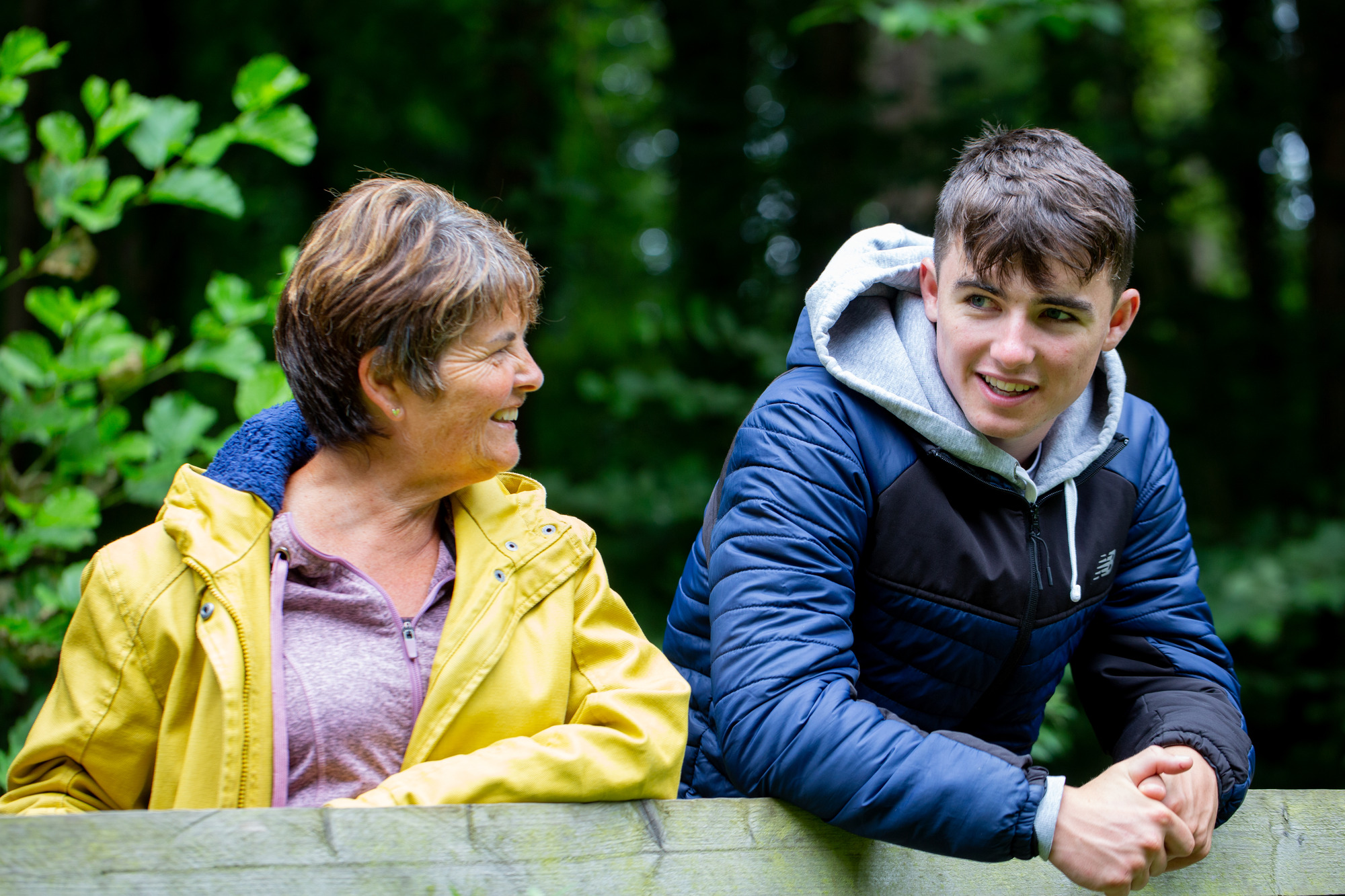 foster carer and young man smiling